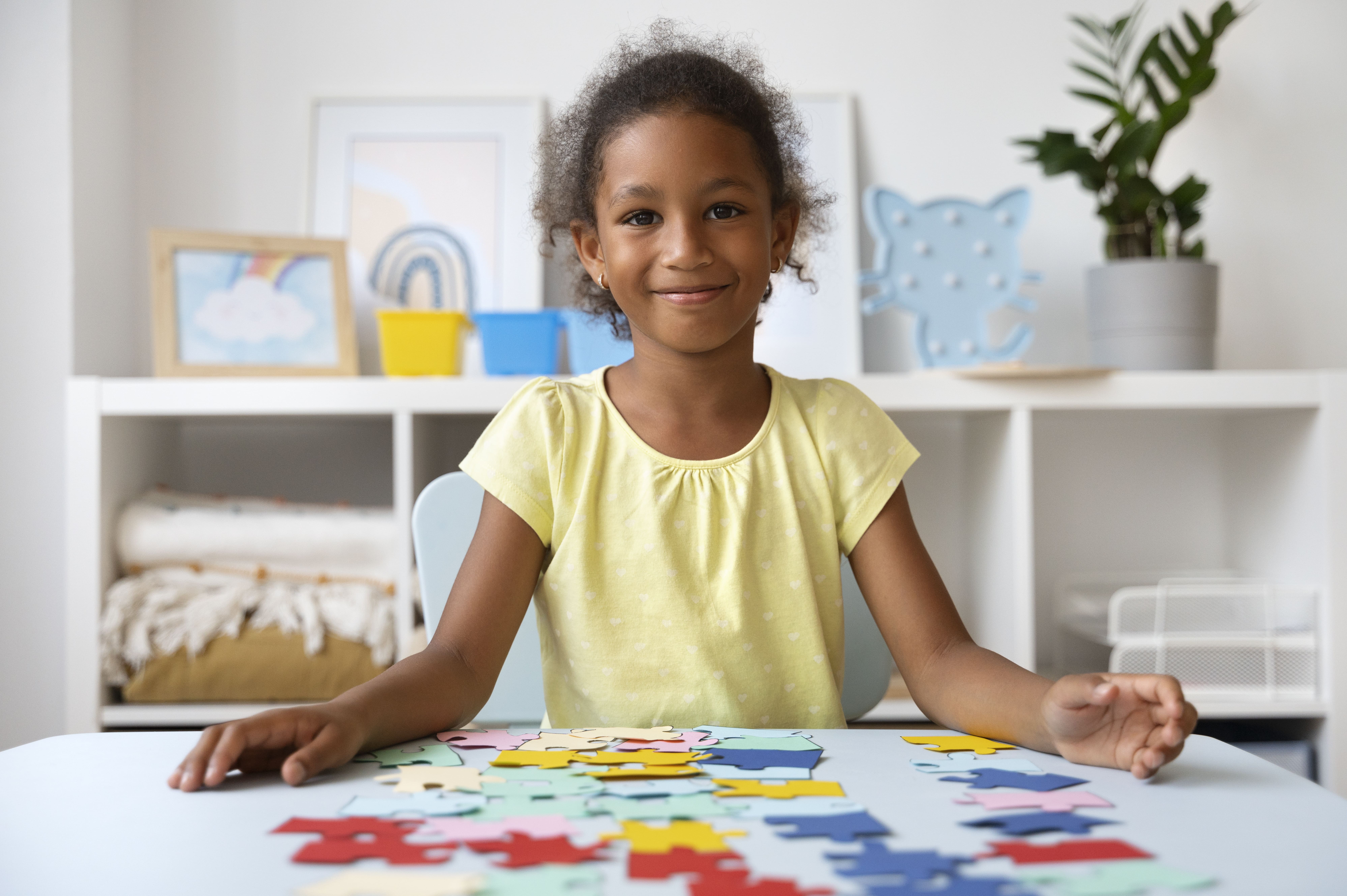 Girl working on a cognitive puzzle activity